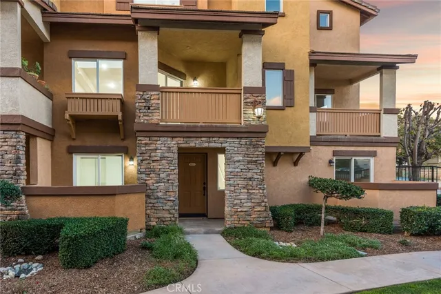 a front view of a house with garage