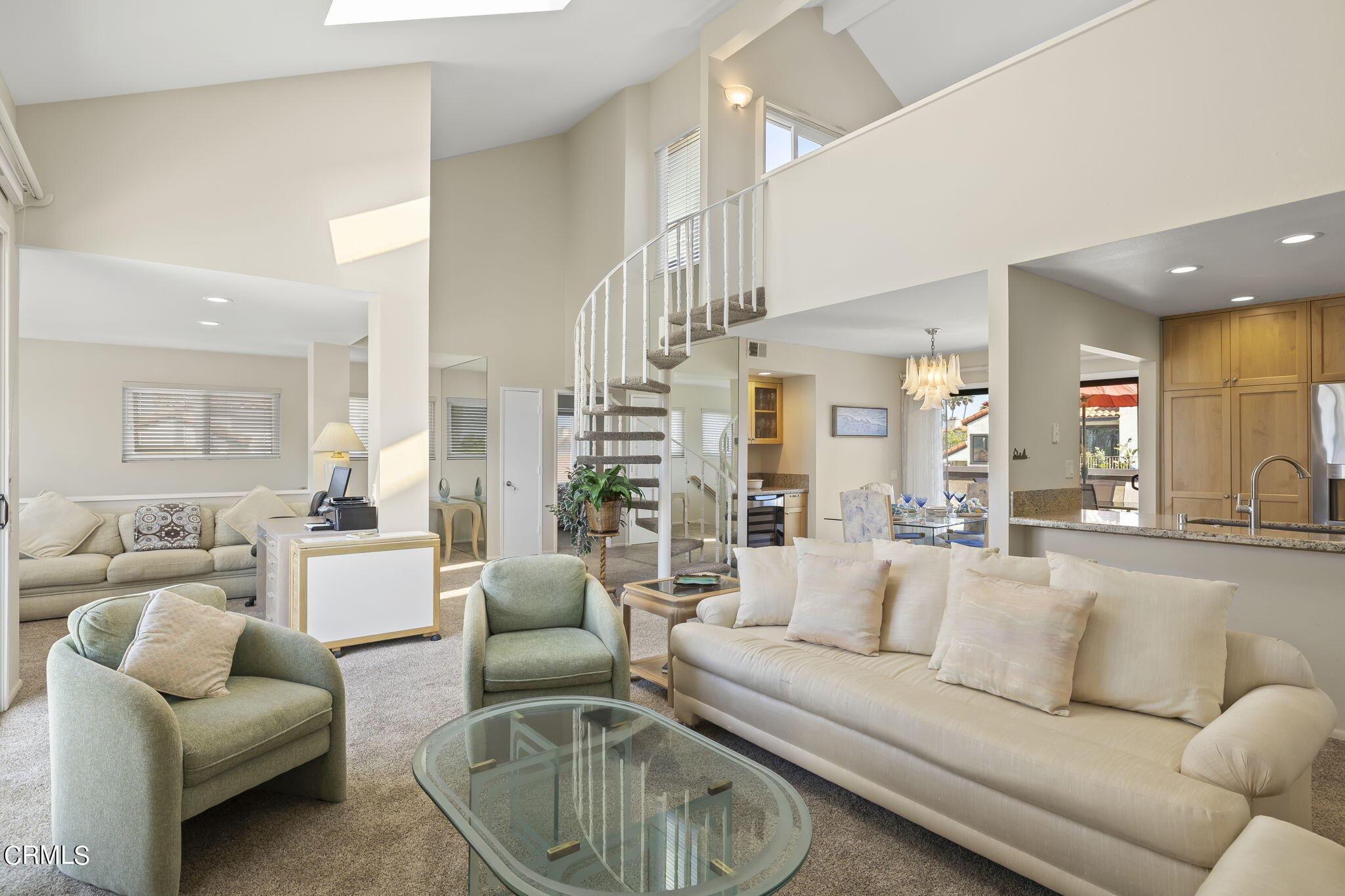 4700 San Sebastian Drive Oxnard, CA 93035 - Photo 17 of 74 a living room with furniture a rug kitchen view and a window