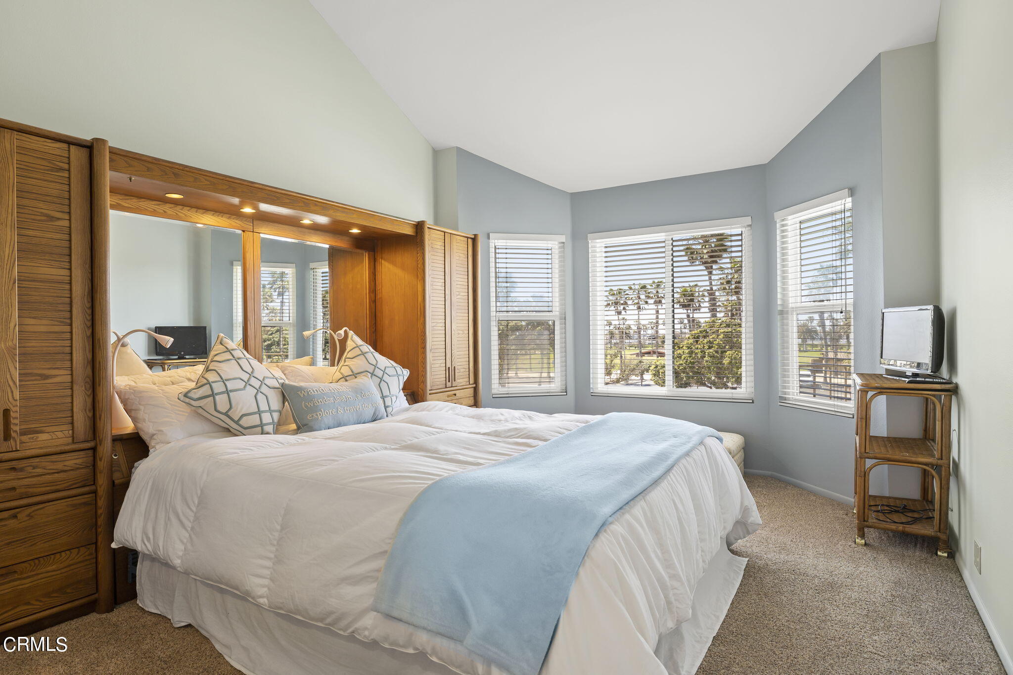 4700 San Sebastian Drive Oxnard, CA 93035 - Photo 33 of 74 a bedroom with a large bed and a large window