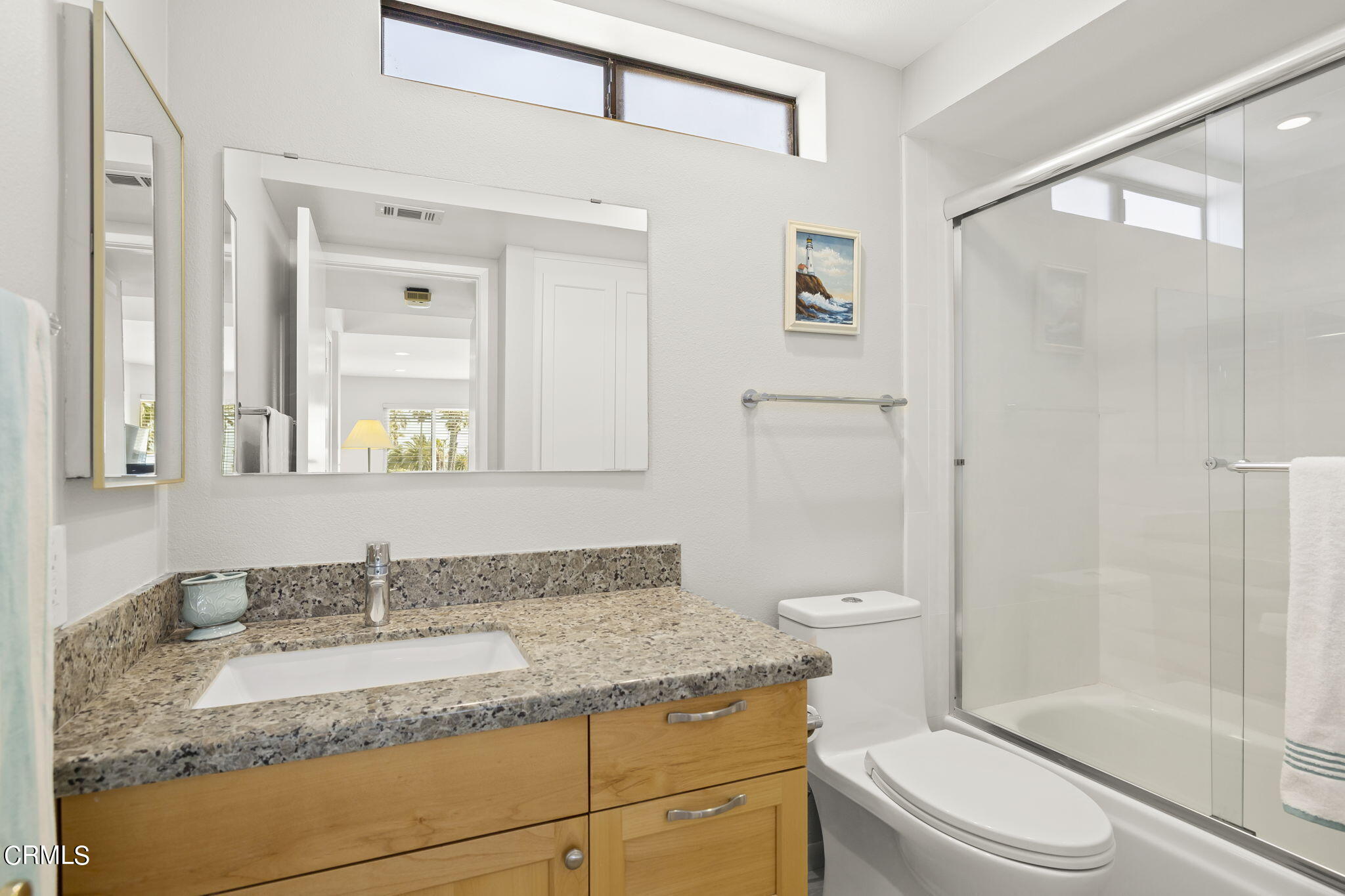 4700 San Sebastian Drive Oxnard, CA 93035 - Photo 39 of 74 a bathroom with a granite countertop sink toilet and shower