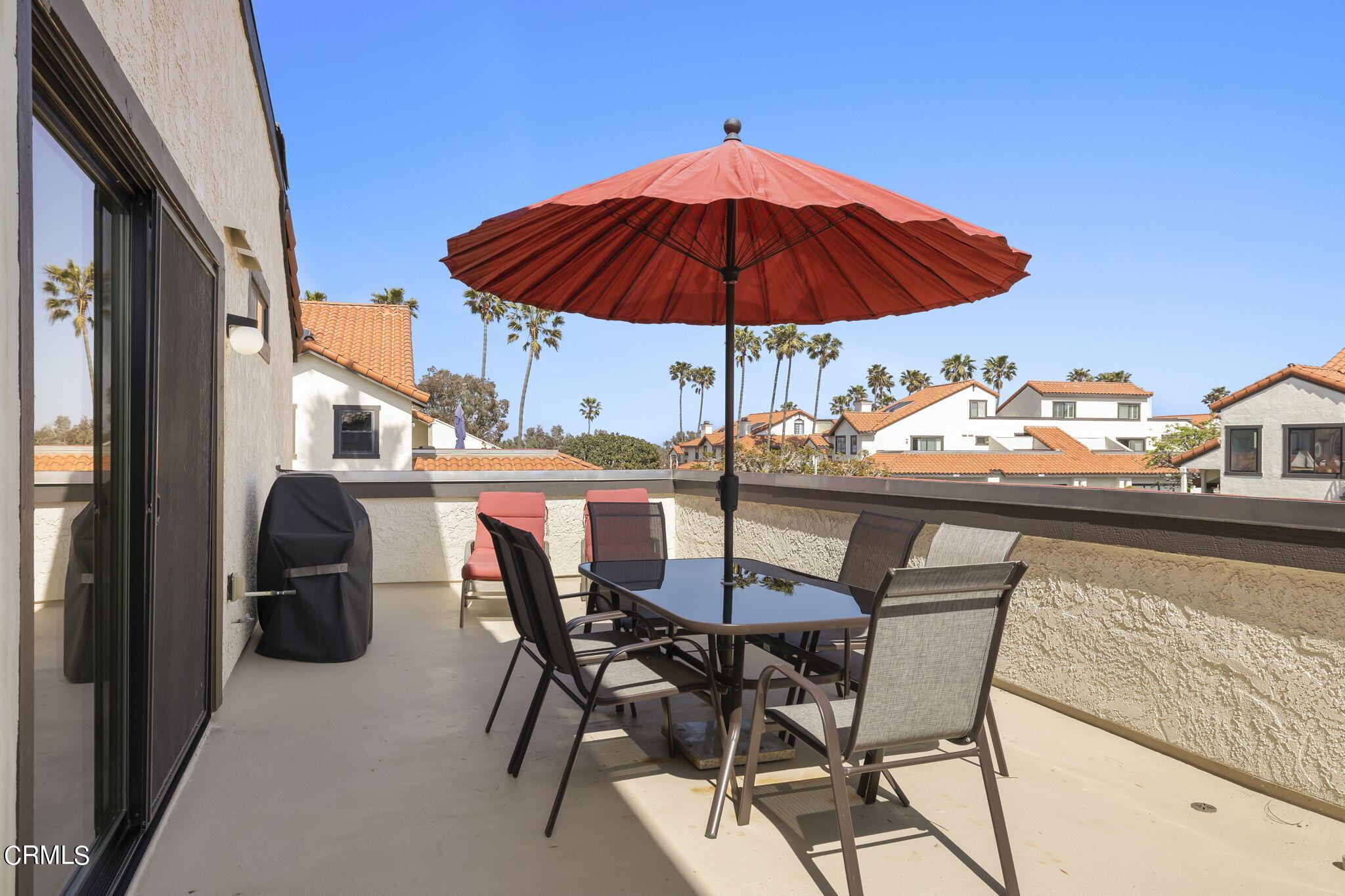 4700 San Sebastian Drive Oxnard, CA 93035 - Photo 40 of 74 a view of balcony with chairs and table
