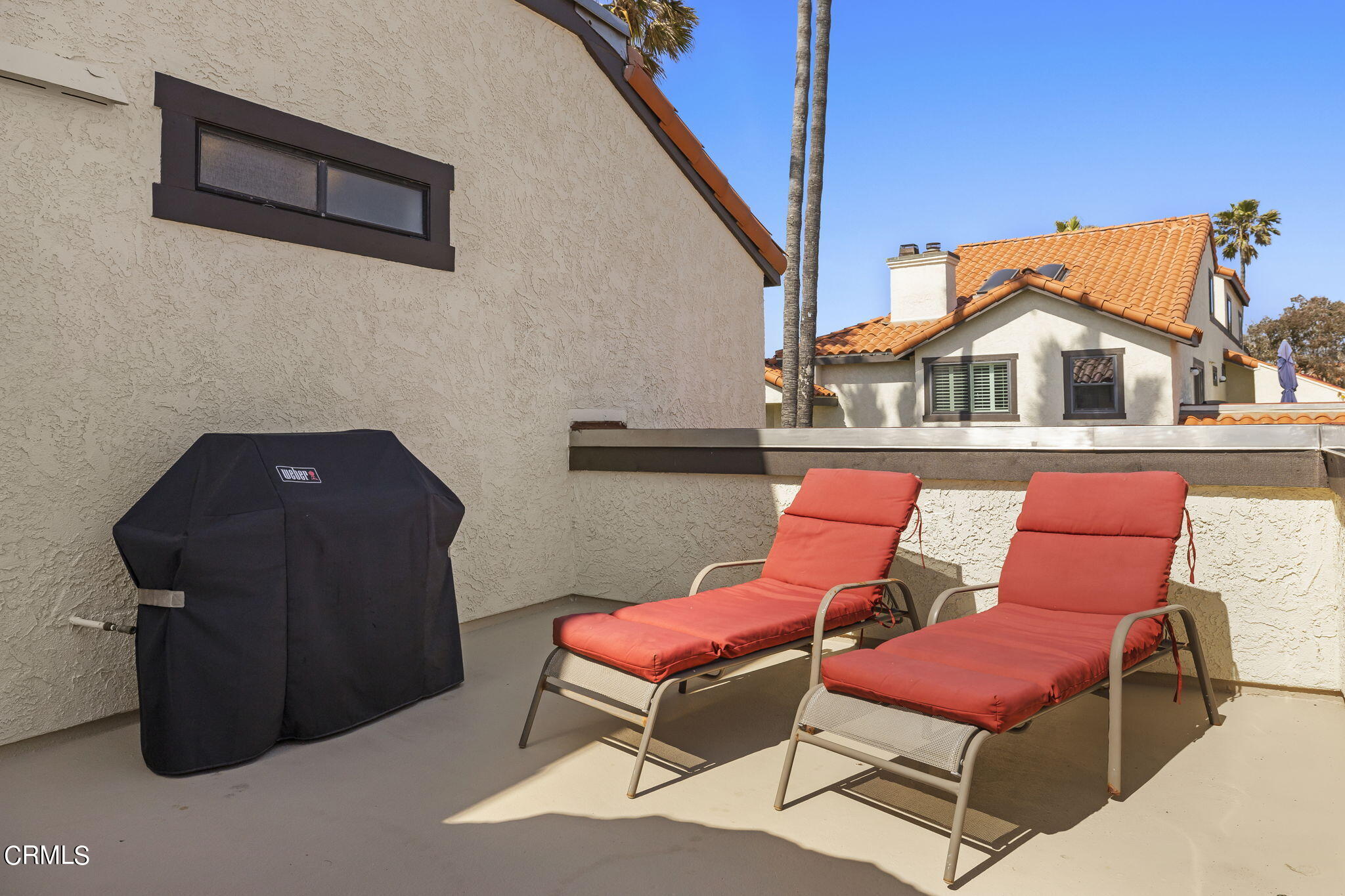 4700 San Sebastian Drive Oxnard, CA 93035 - Photo 42 of 74 a outdoor living space with furniture and a rug