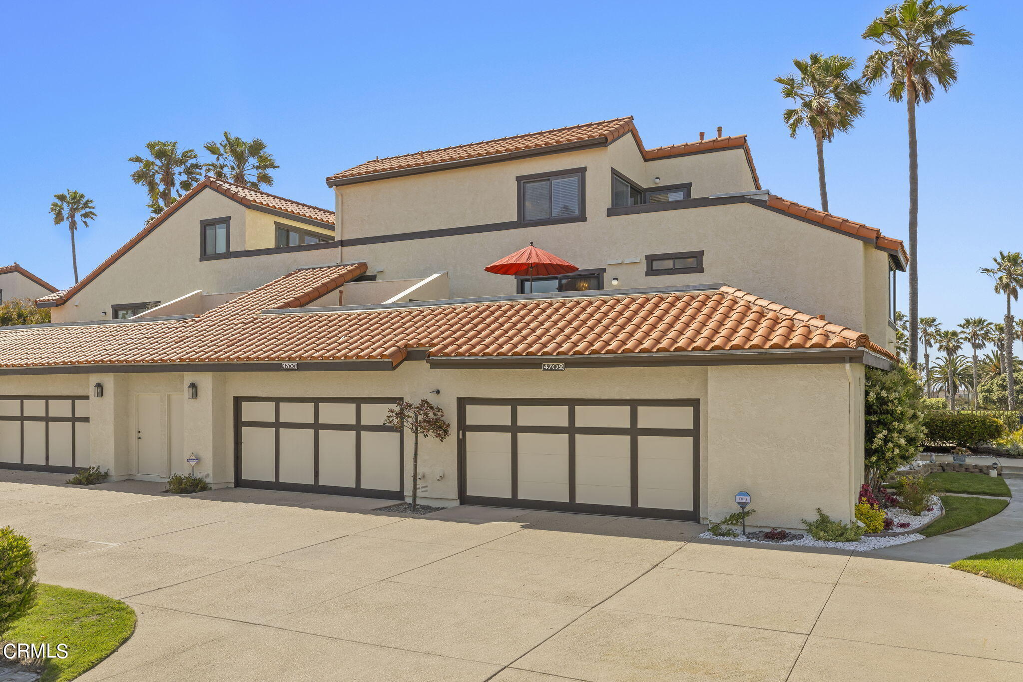 4700 San Sebastian Drive Oxnard, CA 93035 - Photo 51 of 74 a front view of a house with a garage