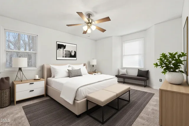 a bedroom with a bed and a couch