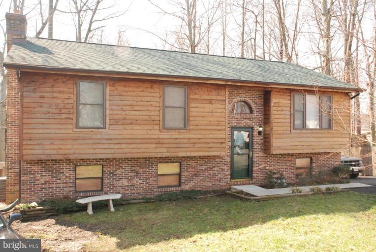 657 Running Fox Road Lusby, MD 20657 - Photo 1 of 16 cedar and brick front--photo doesn't do it justice