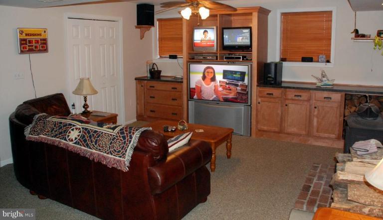 657 Running Fox Road Lusby, MD 20657 - Photo 2 of 16 owner is a craftsman-built-in entertainment center