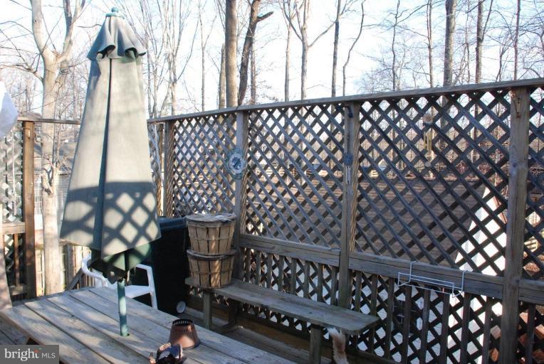 657 Running Fox Road Lusby, MD 20657 - Photo 15 of 16 right off dining room, privacy lattice fence