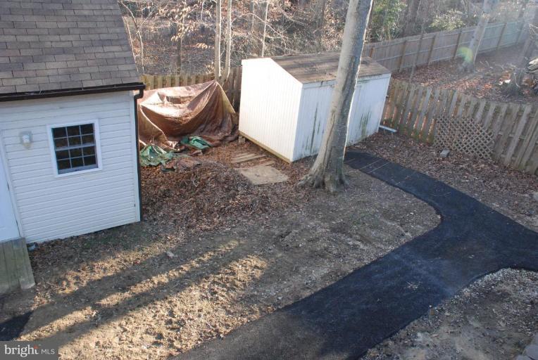 657 Running Fox Road Lusby, MD 20657 - Photo 16 of 16 garden shed to right; workshop to left