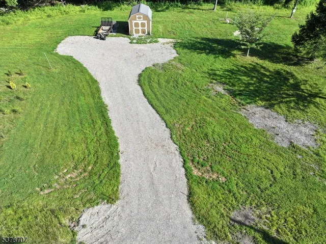 a view of a garden with an outdoor space