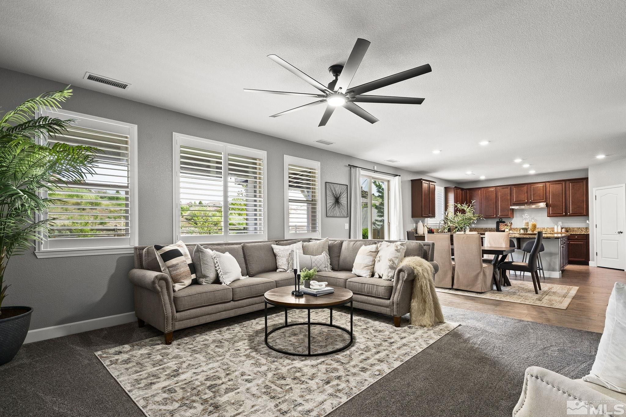 1820 Scott Valley Road Reno, NV 89523 - Photo 14 of 35 a living room with furniture ceiling fan and a window