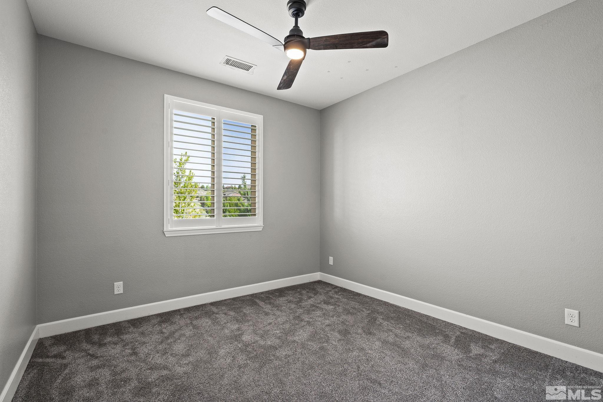 1820 Scott Valley Road Reno, NV 89523 - Photo 25 of 35 a view of room with a ceiling fan and window