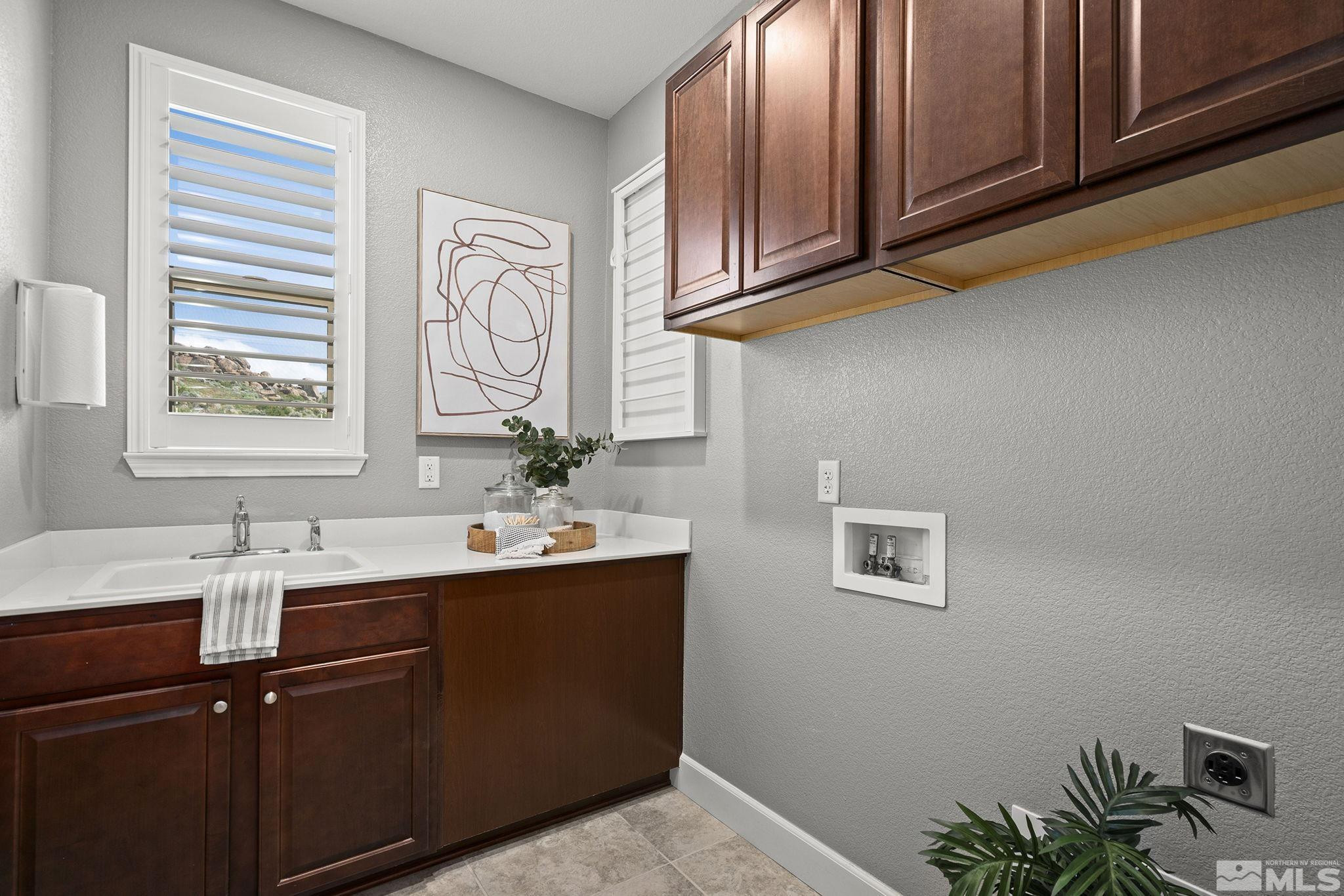 1820 Scott Valley Road Reno, NV 89523 - Photo 28 of 35 a bathroom with a sink and a mirror