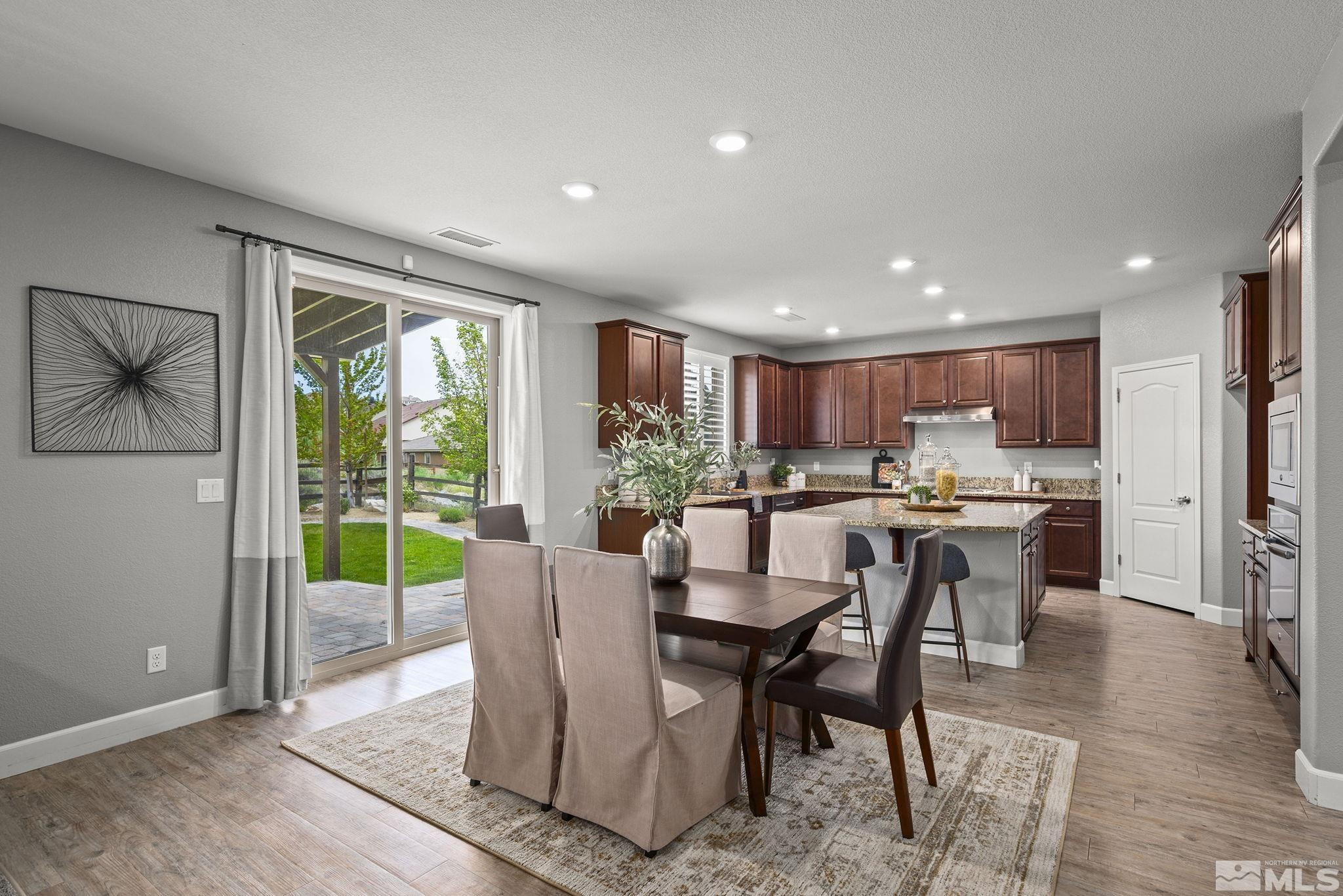 1820 Scott Valley Road Reno, NV 89523 - Photo 7 of 35 a view of a dining room with furniture window and wooden floor
