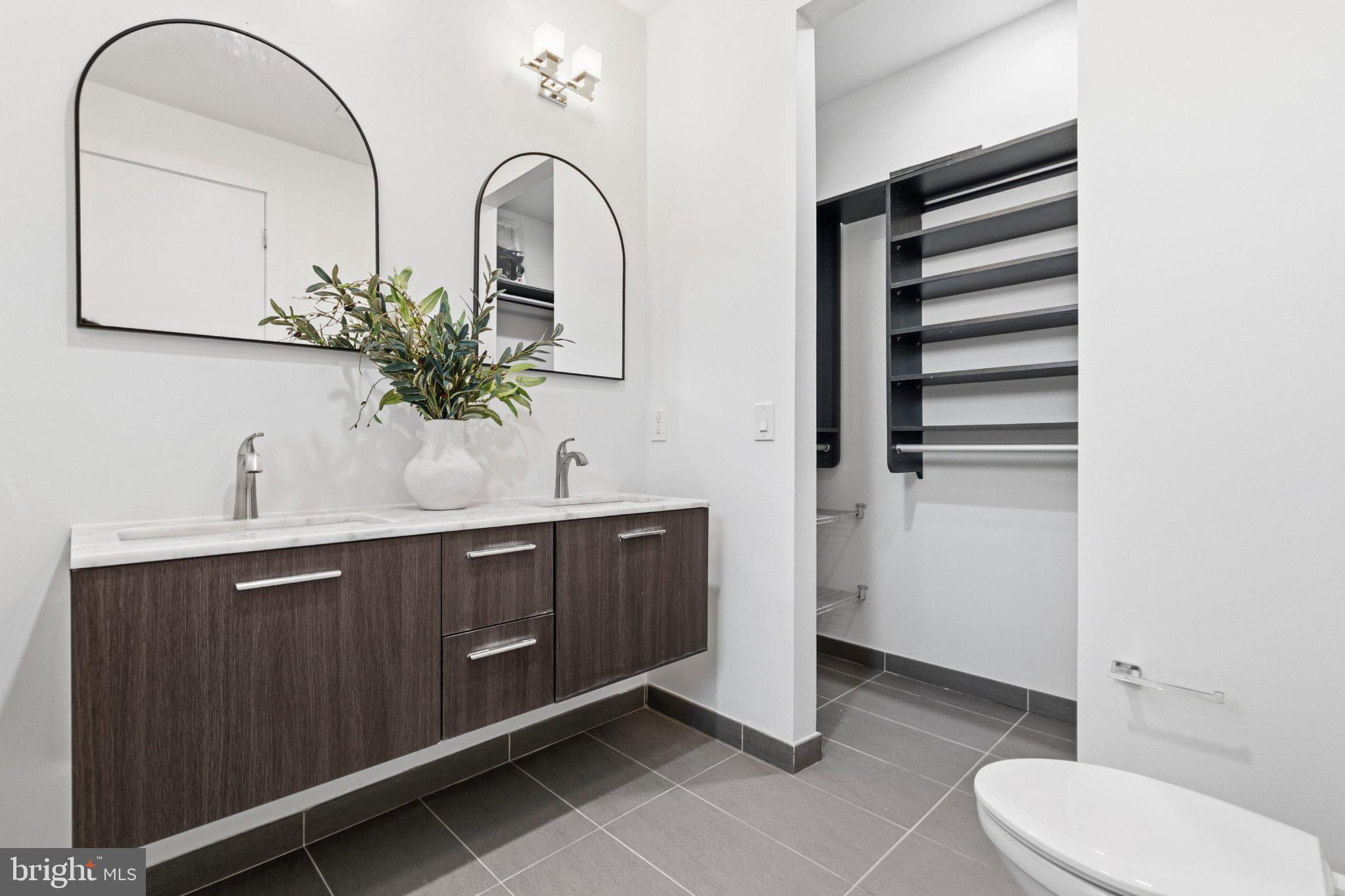 1837 Kalorama Road Northwest, Unit F Washington, DC 20009 - Photo 30 of 42 Sleek modern bathroom with elegance.