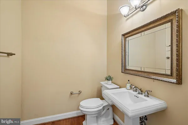 a spacious bedroom with a bed and a large window