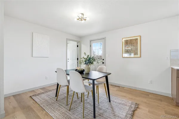 a view of a dining room with furniture