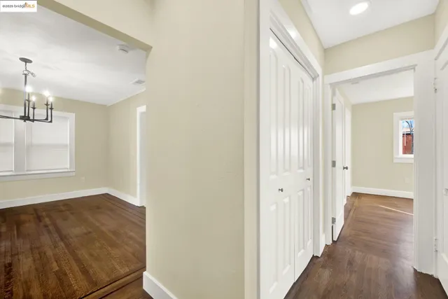 wooden floor in a hall with an entryway