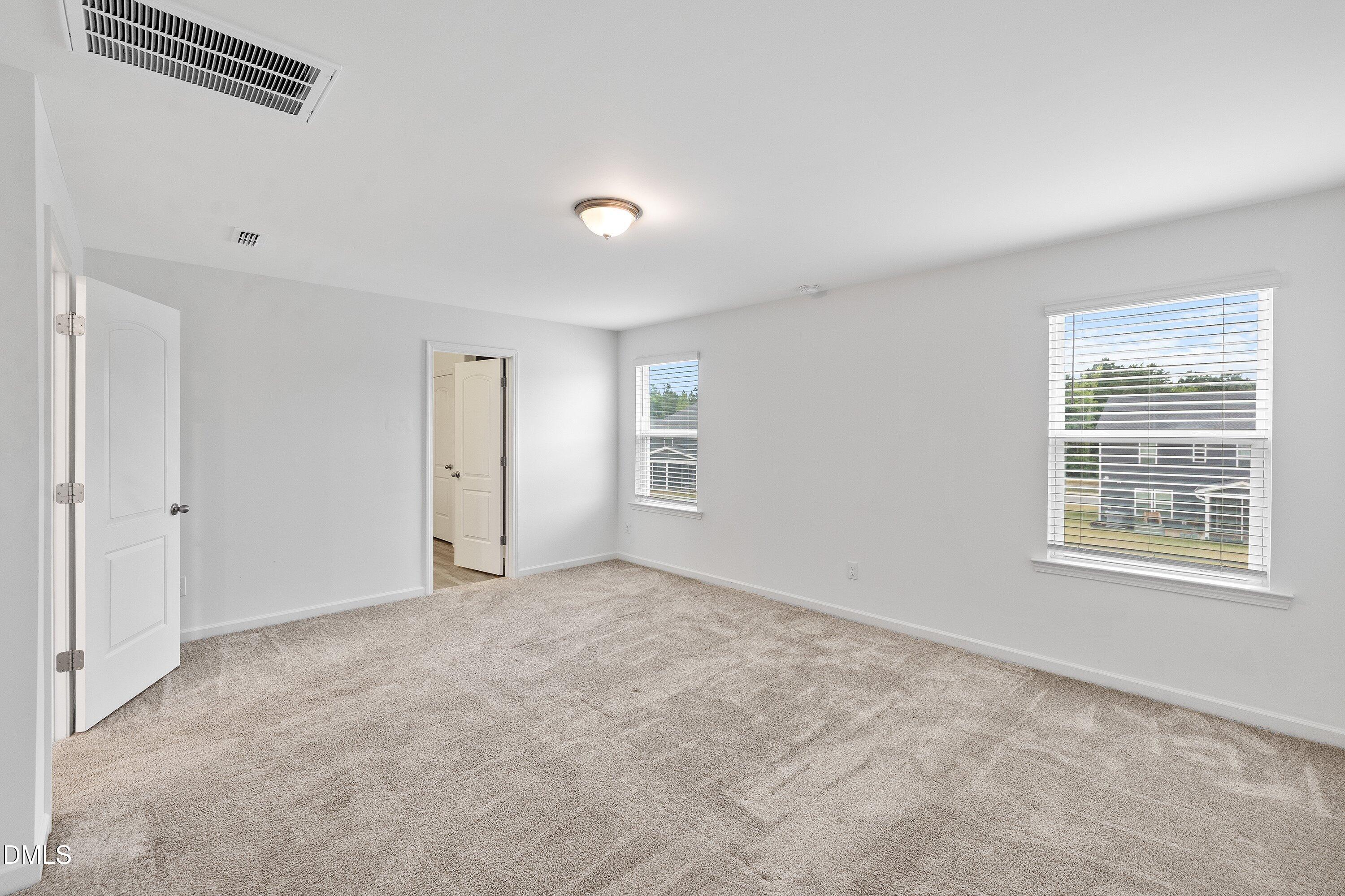 2129 Crestwood Rdg Drive Durham, NC 27704 - Photo 10 of 15 a view of an empty room with a window
