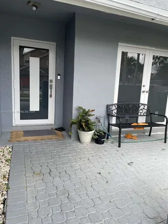 a view of a yard with patio