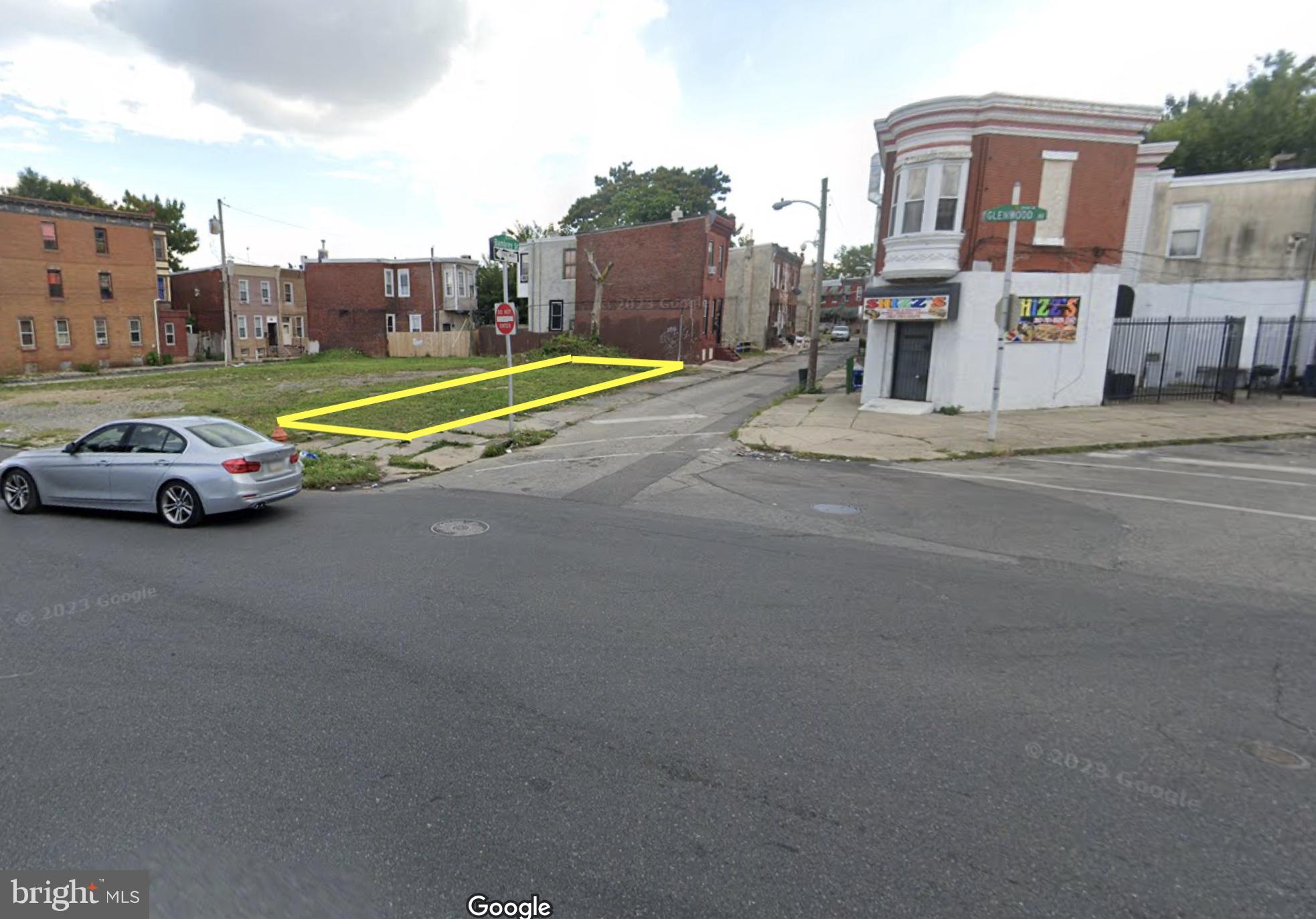 2526 West Diamond Street Philadelphia, PA 19121 - Photo 3 of 4 a view of a cars park in front of a building