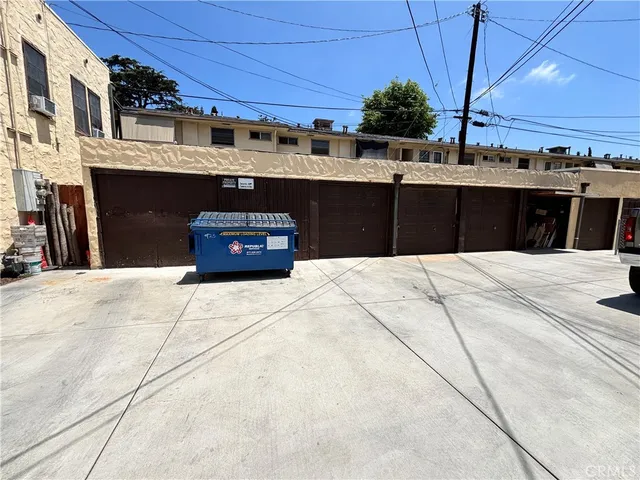 a kitchen with a table and chairs