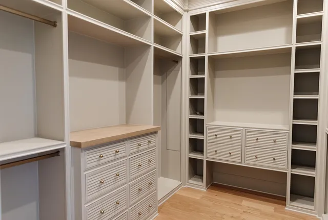 a view of an empty walk in closet