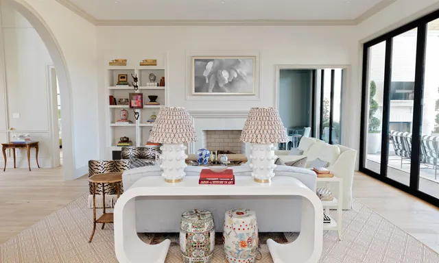 a very nice looking dining room with a large window