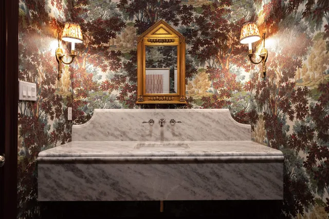 a view of fountain and small yard