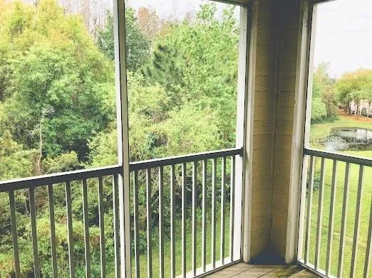 a view of a room with a large window