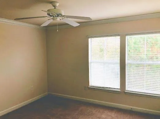 a view of a livingroom with a window