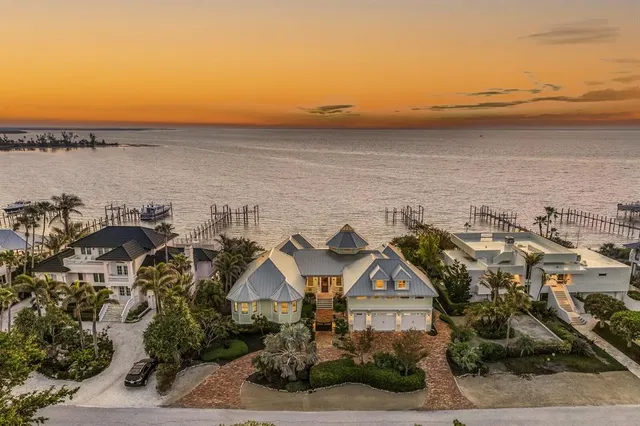 a view of a lake with a building in the background
