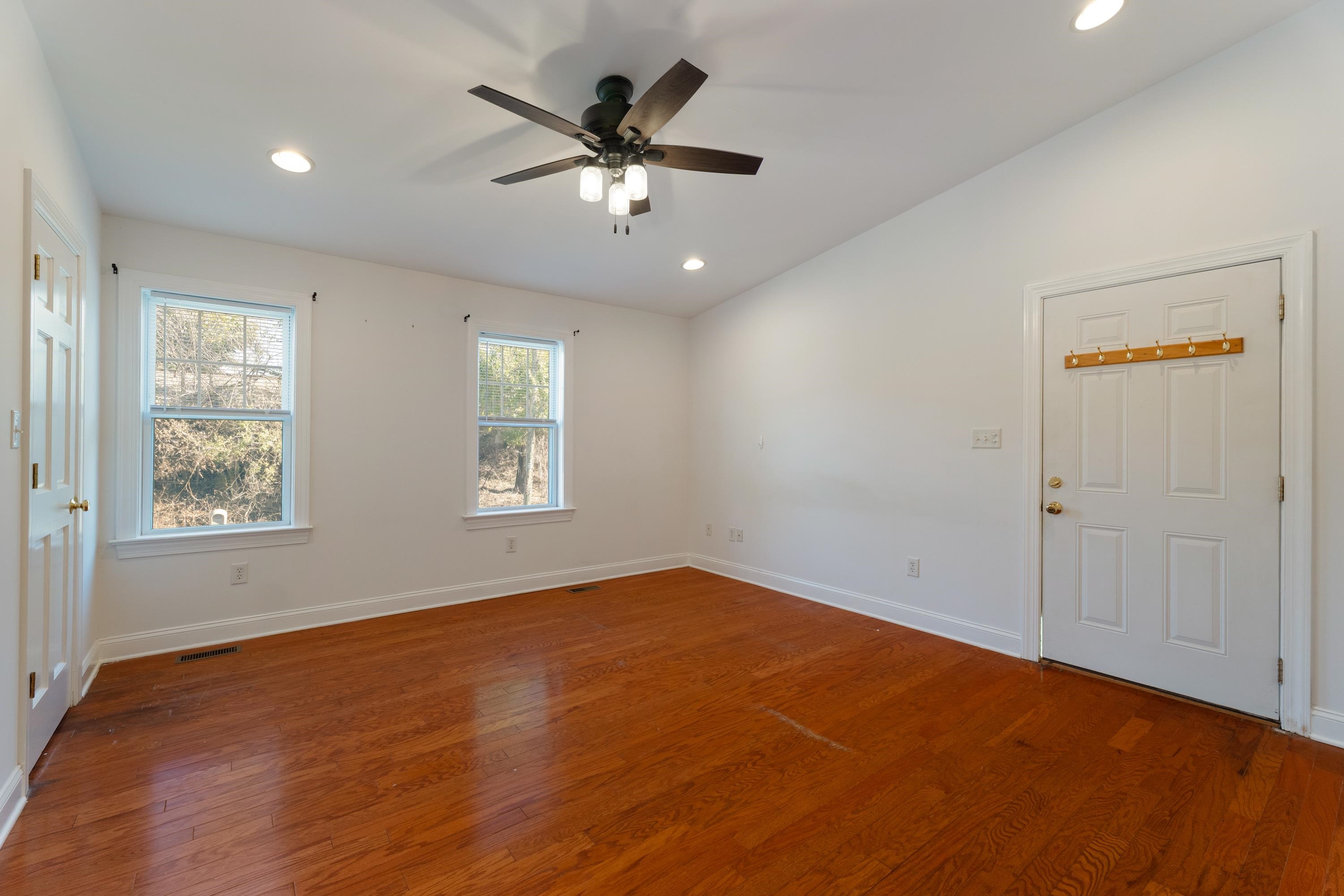 1261 Blue Ridge Avenue Crozet, VA 22932 - Photo 15 of 25 wooden floor in an empty room with a window