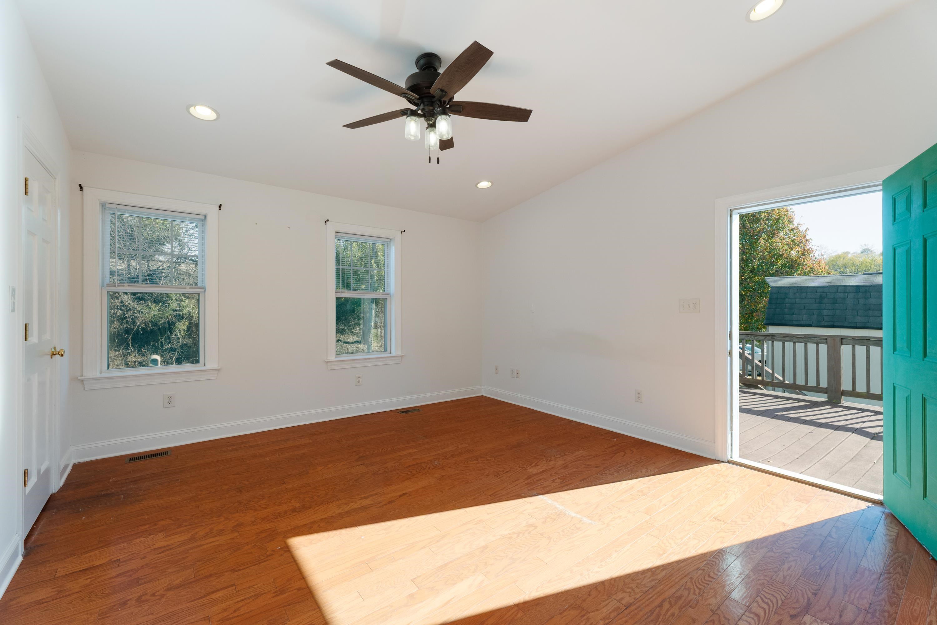1261 Blue Ridge Avenue Crozet, VA 22932 - Photo 16 of 25 a view of empty room with wooden floor and fan