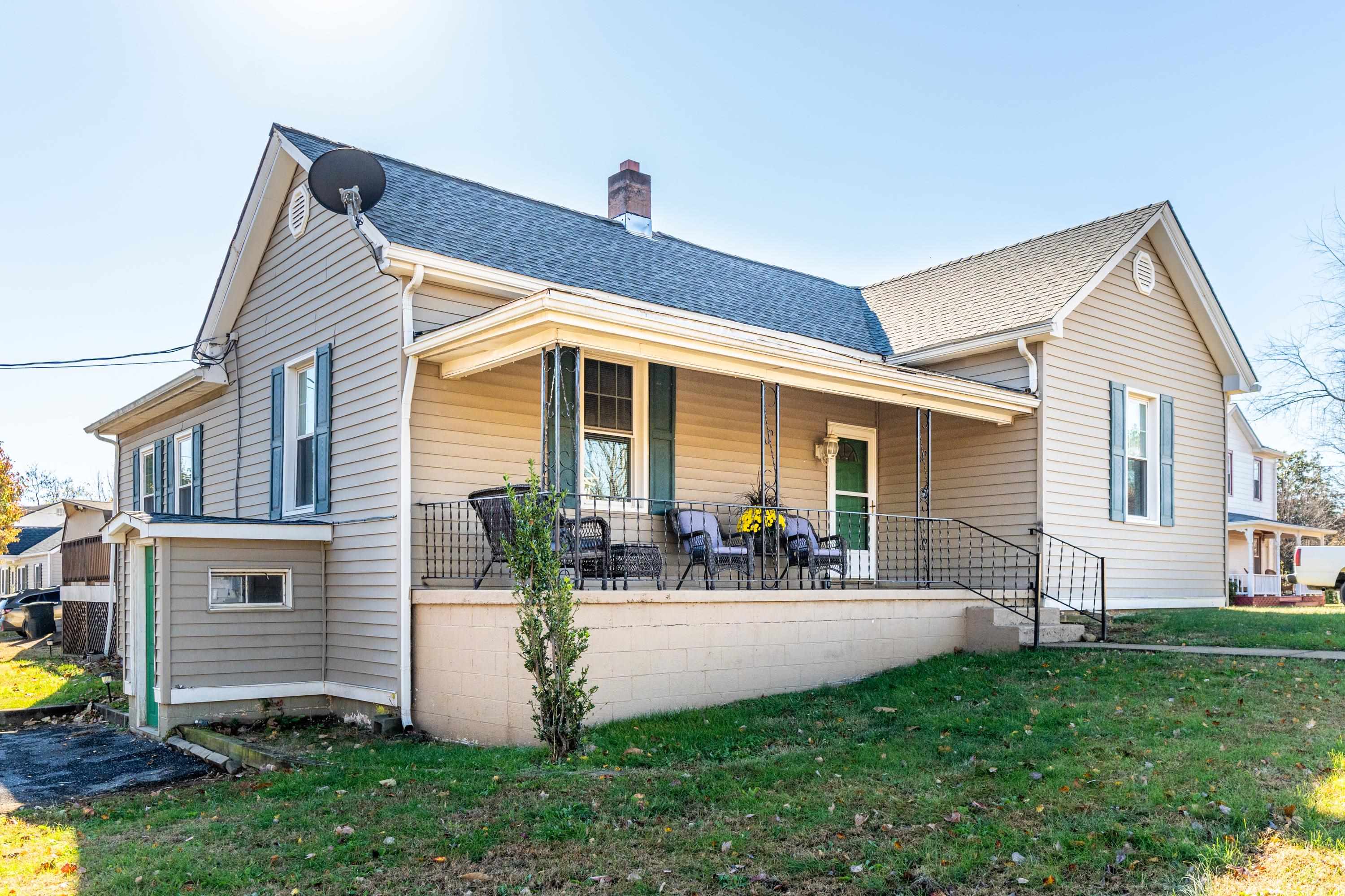 1261 Blue Ridge Avenue Crozet, VA 22932 - Photo 2 of 25 a front view of a house with patio