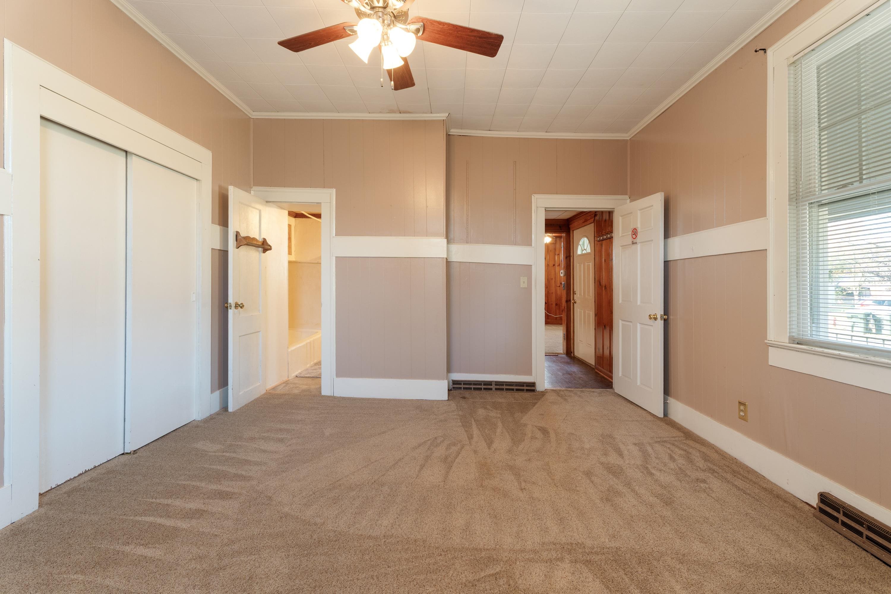 1261 Blue Ridge Avenue Crozet, VA 22932 - Photo 10 of 25 an empty room with closet and windows