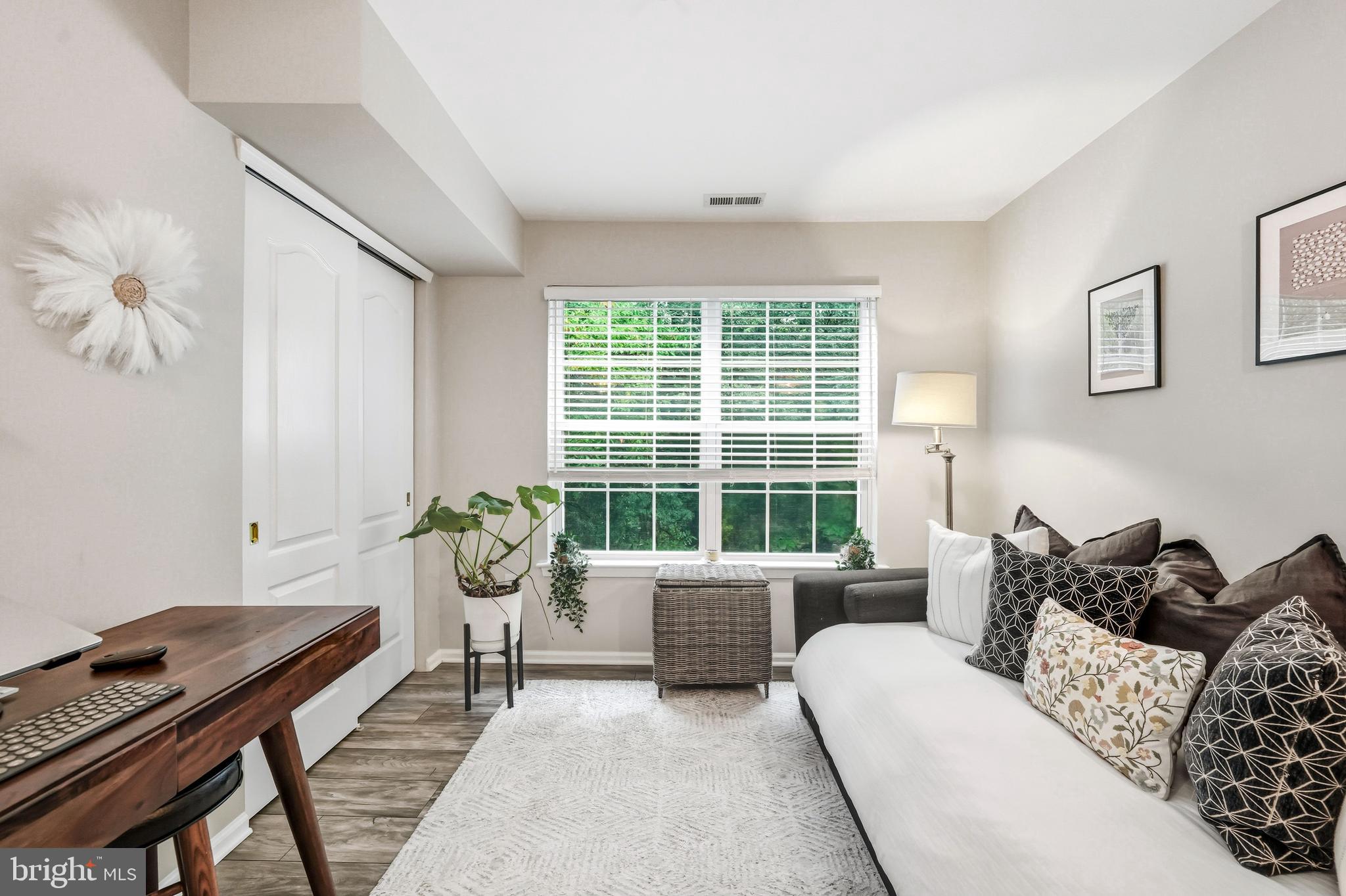 144 Natalie Road Delran, NJ 08075 - Photo 16 of 43 a living room with furniture and floor to ceiling windows