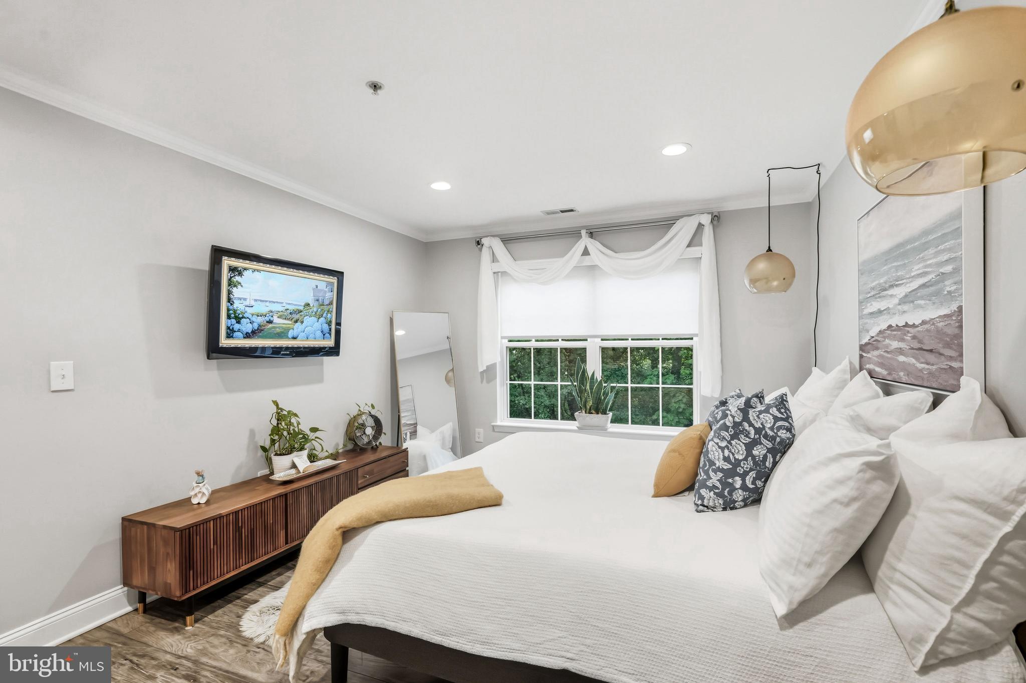 144 Natalie Road Delran, NJ 08075 - Photo 18 of 43 a bed room with a bed mirror and a window