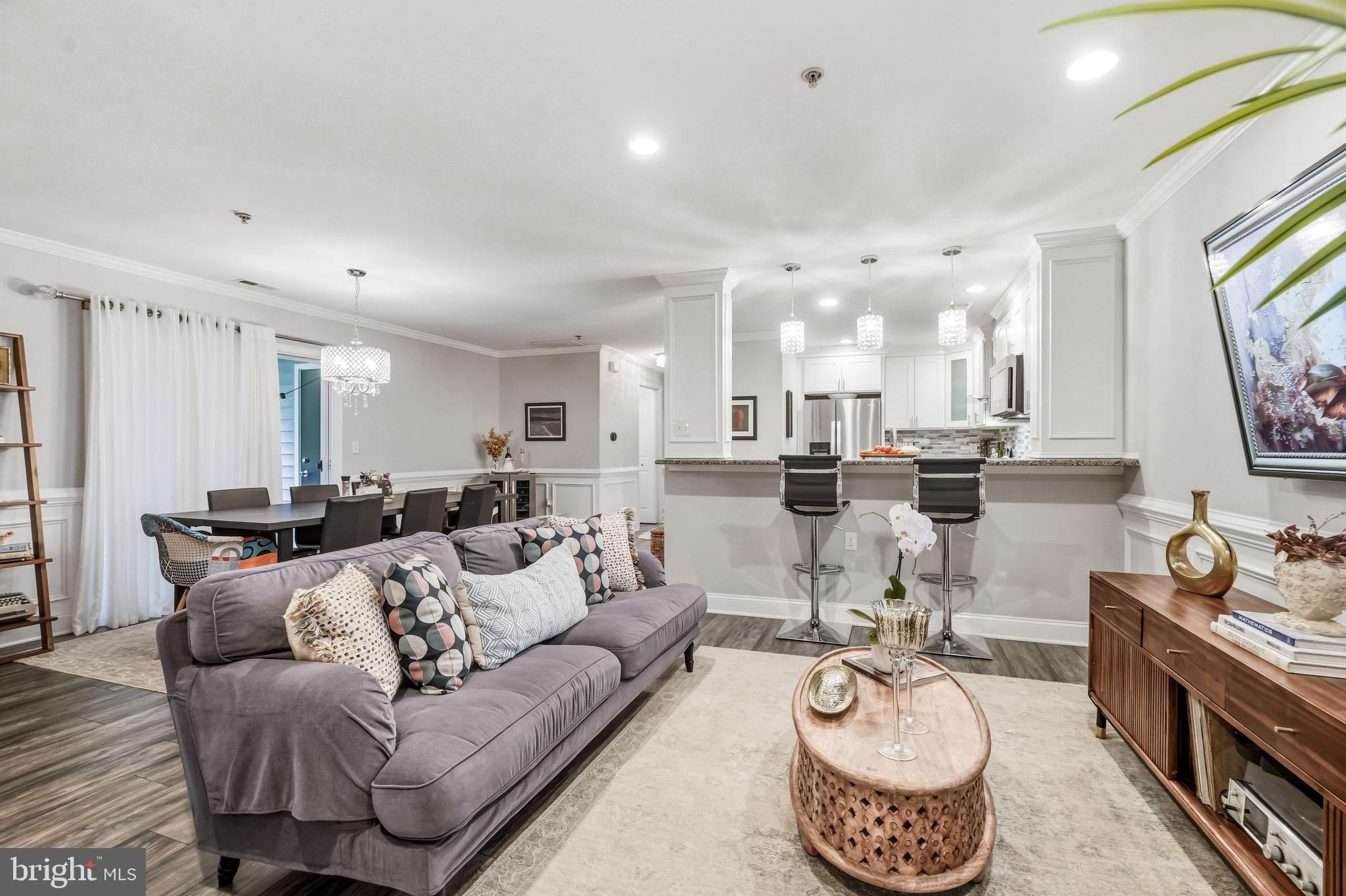 144 Natalie Road Delran, NJ 08075 - Photo 2 of 43 a living room with furniture or couch and a flat screen tv