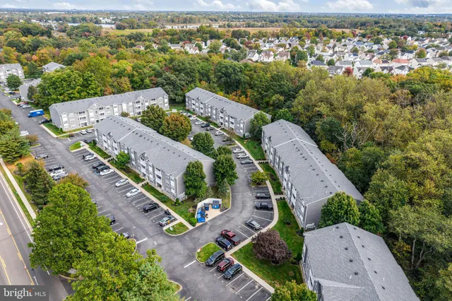 an aerial view of a city with lots of residential buildings