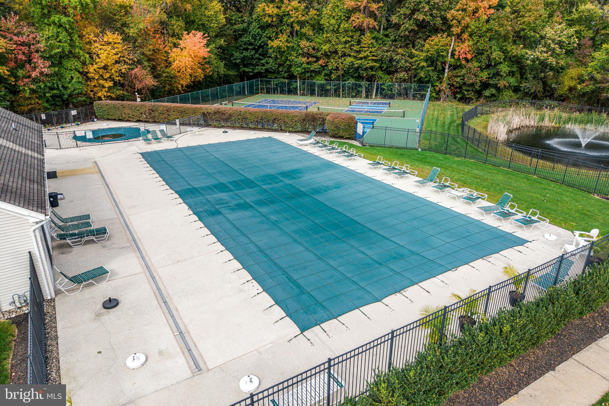 144 Natalie Road Delran, NJ 08075 - Photo 41 of 43 a view of a backyard with swimming pool