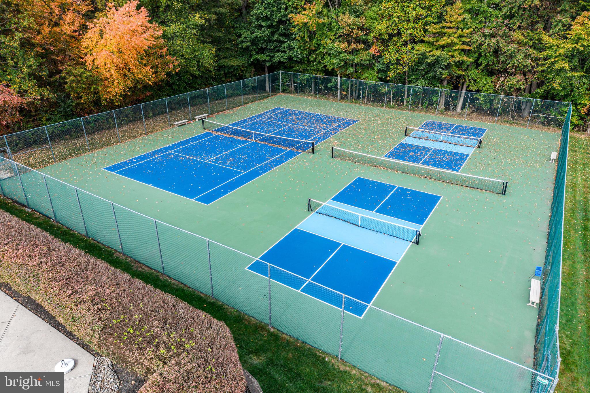144 Natalie Road Delran, NJ 08075 - Photo 42 of 43 a view of a tennis ground with large trees