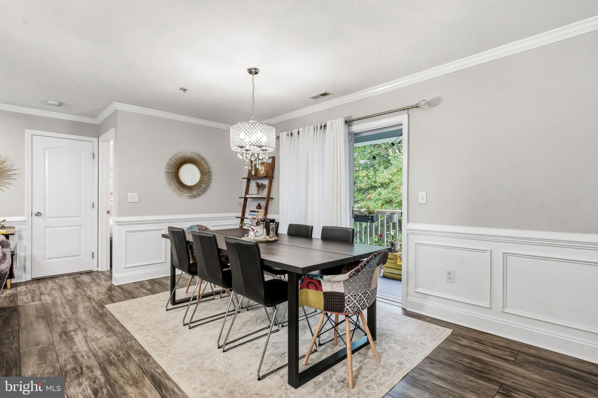 144 Natalie Road Delran, NJ 08075 - Photo 7 of 43 a view of a dining room with furniture and wooden floor