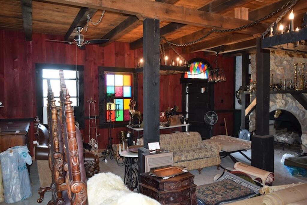 519 Roberson Mill Road Southeast Floyd, VA 24091 - Photo 12 of 79 a living room with lots of furniture and a chandelier