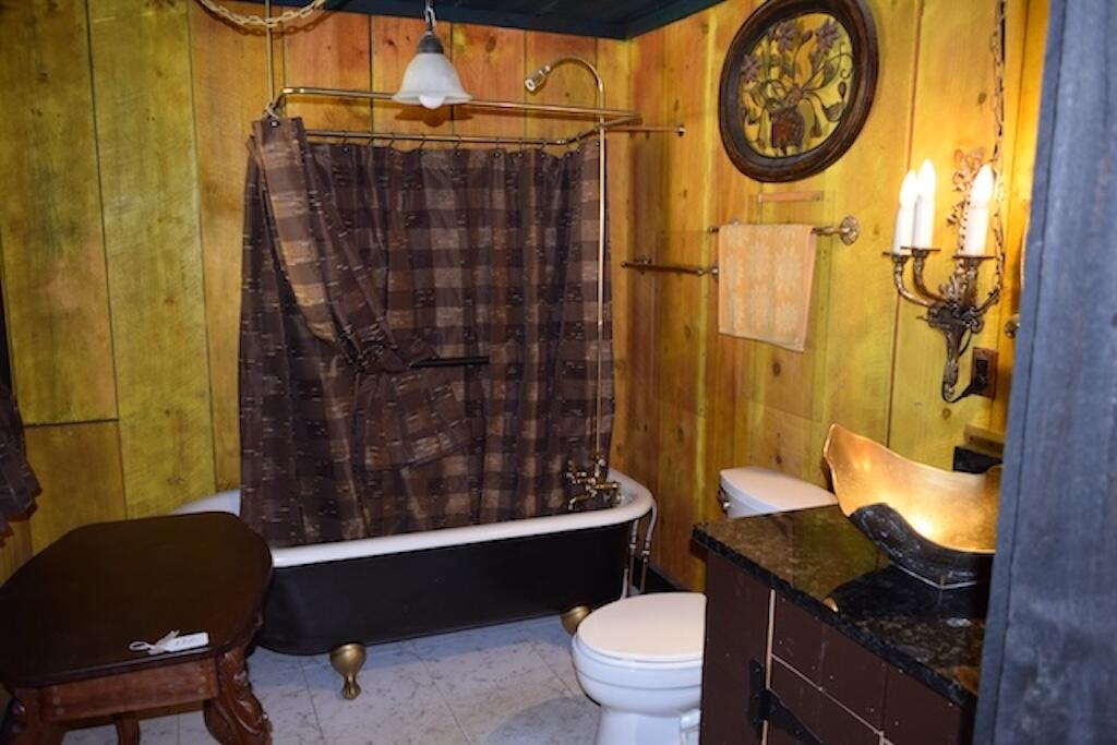 519 Roberson Mill Road Southeast Floyd, VA 24091 - Photo 15 of 79 a bathroom with a granite countertop sink toilet and shower