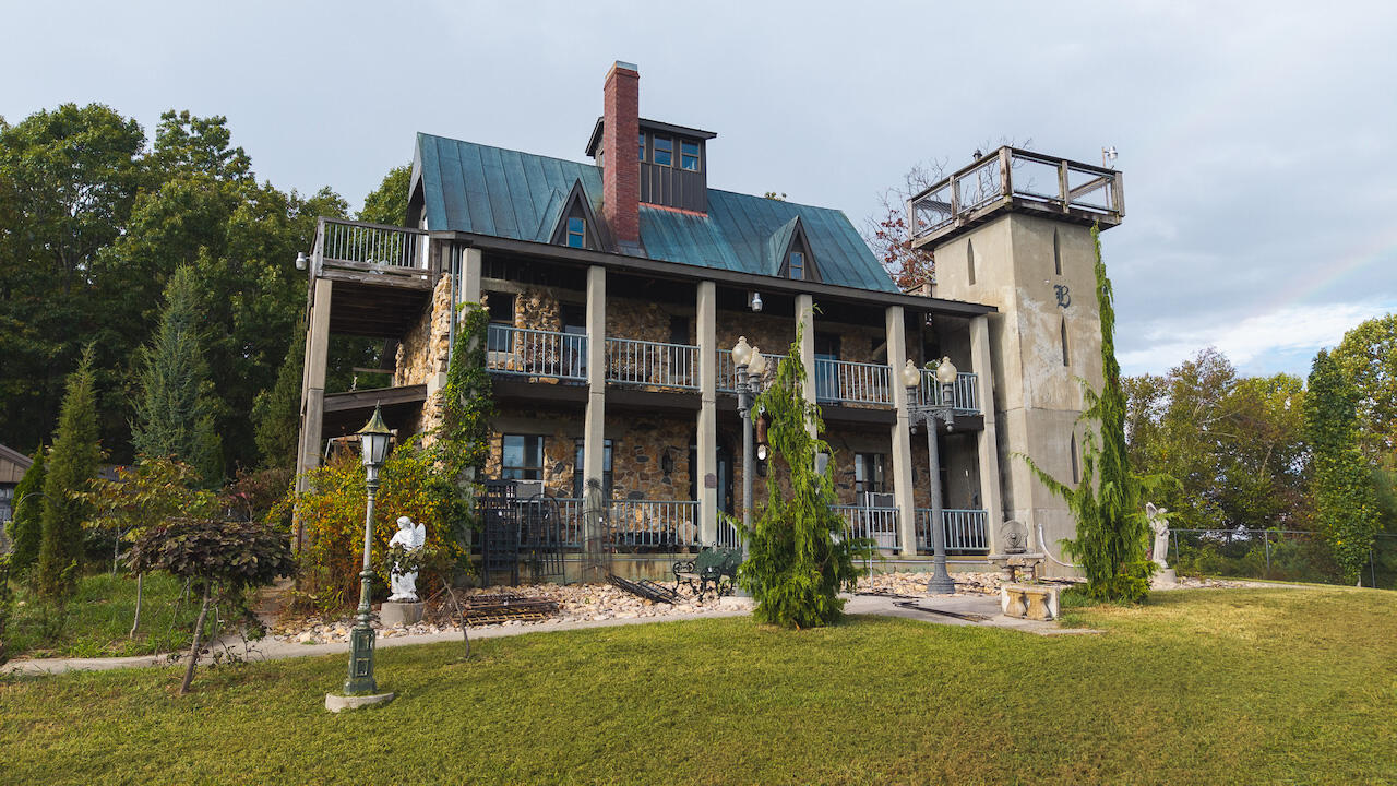 519 Roberson Mill Road Southeast Floyd, VA 24091 - Photo 2 of 79 a front view of a house with garden