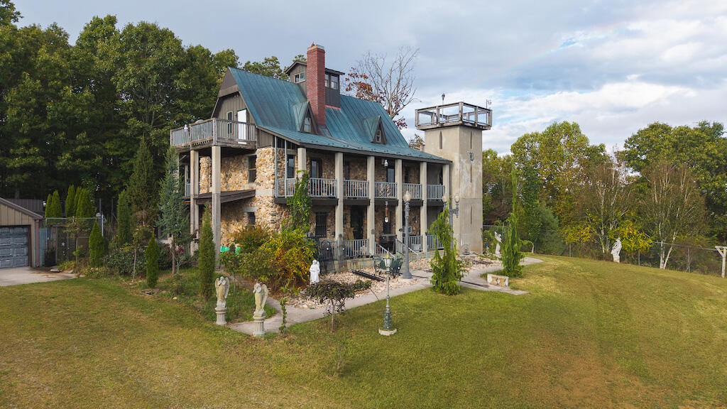 519 Roberson Mill Road Southeast Floyd, VA 24091 - Photo 3 of 79 a view of a house with a yard and large trees