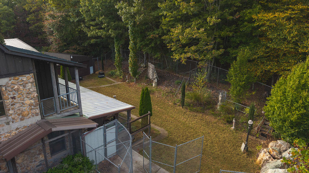 519 Roberson Mill Road Southeast Floyd, VA 24091 - Photo 53 of 79 a backyard of a house with table and chairs