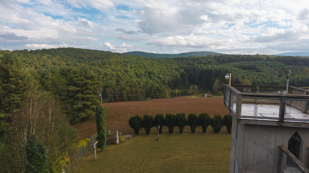 519 Roberson Mill Road Southeast Floyd, VA 24091 - Photo 55 of 79 a view of a lake with a mountain in the background