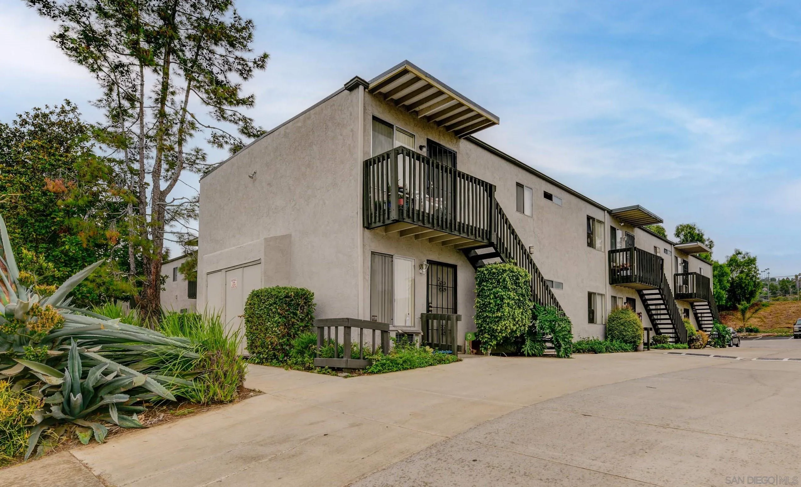 9550 Campo Road Spring Valley, CA 91977 - Photo 1 of 16 a front view of a house with a yard