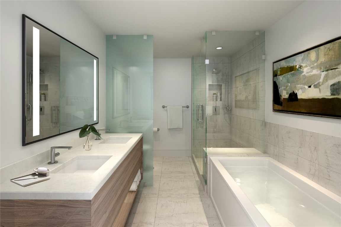 75 Hunki Dori Court, Unit W312 Keystone, CO 80435 - Photo 8 of 35 a bathroom with a tub a sink and mirror